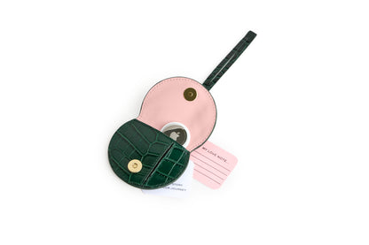 Mini Luna Charm in Vert Italian leather bag charm, front view with note and air tag