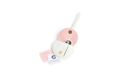 Mini Luna Charm in White Italian leather bag charm, front open view air tag and love note.