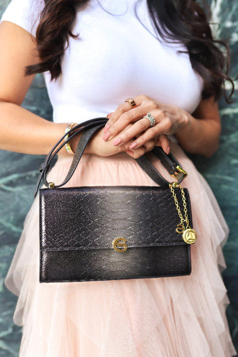 Grey luxury Italian leather Selene handbag with matching Mini Love Charm handcrafted in Italy by Chau Sáenz.