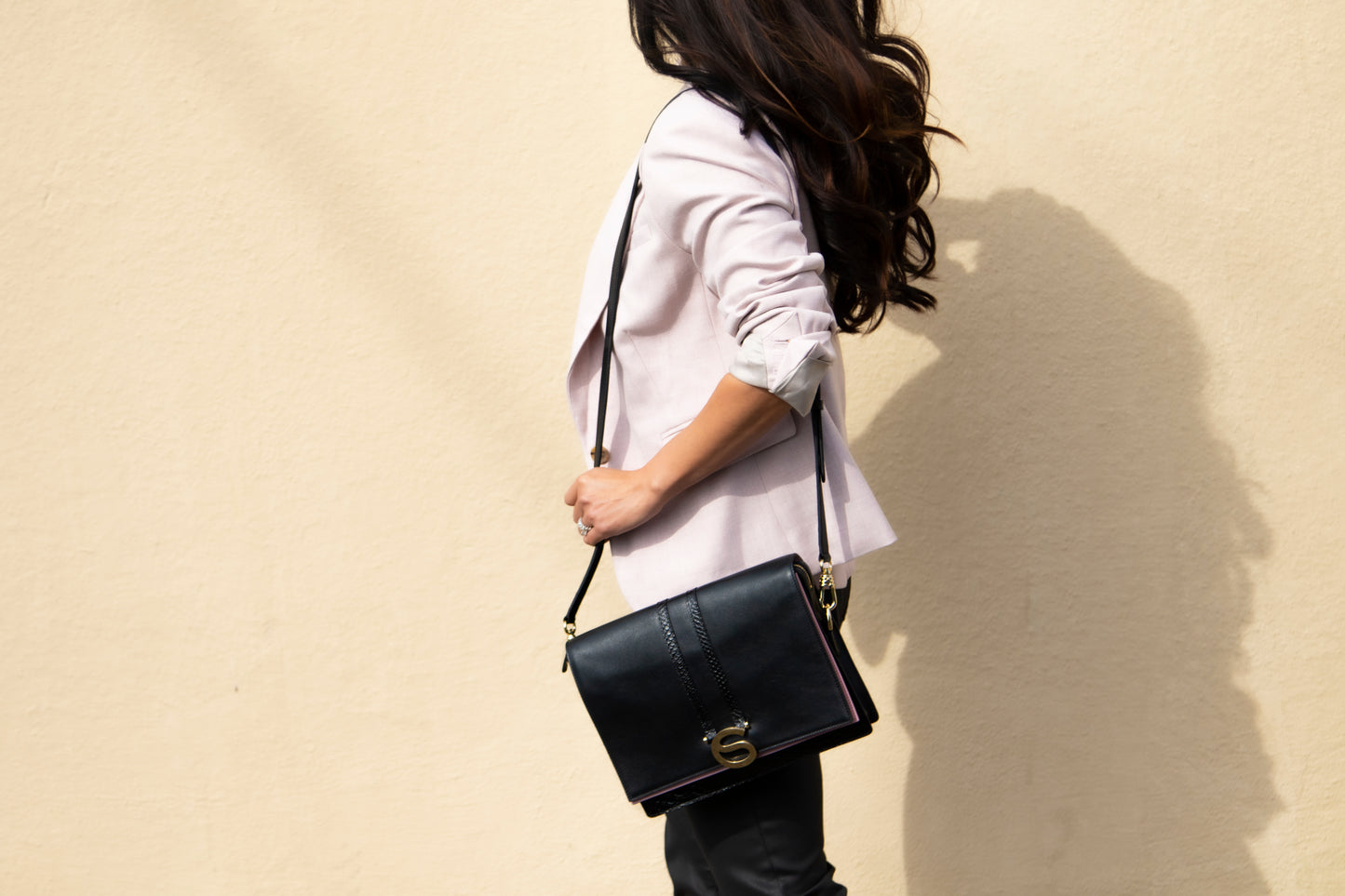 The Rose Bag worn crossbody in Italian leather by Chau Sáenz.