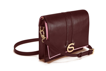 The Rose Bag in Oxblood Italian leather, convertible handbag handcrafted in Italy, side view